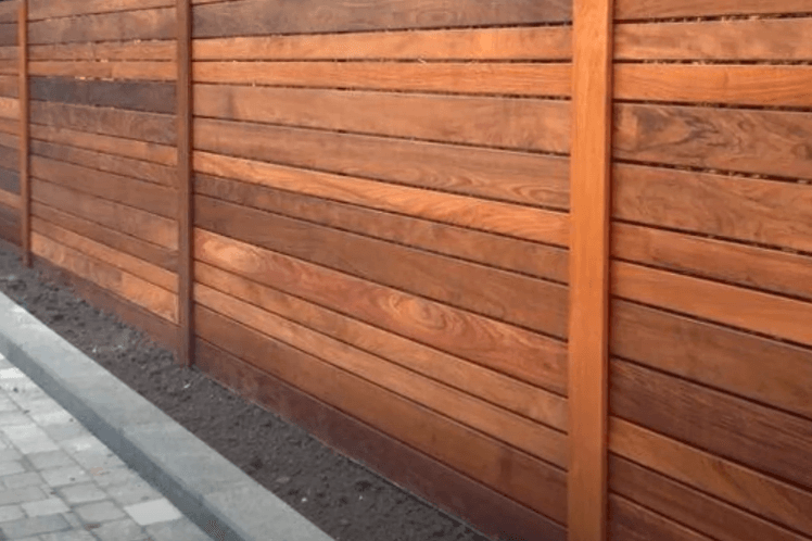 horizontal hardwood fence installation with premium finish sanded and polished wood fence in whittier ca