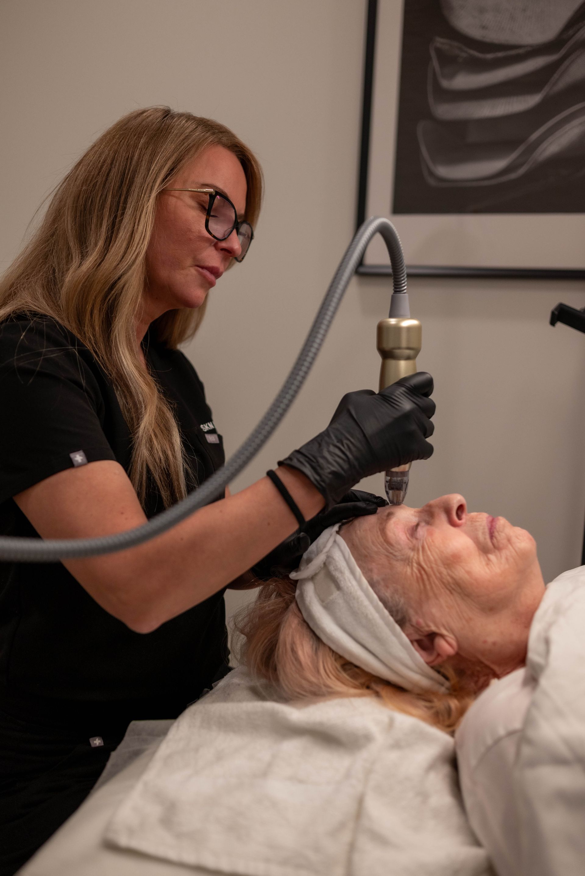 a woman is getting a treatment