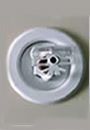 A silver, circular recessed light fixture with a visible bulb.