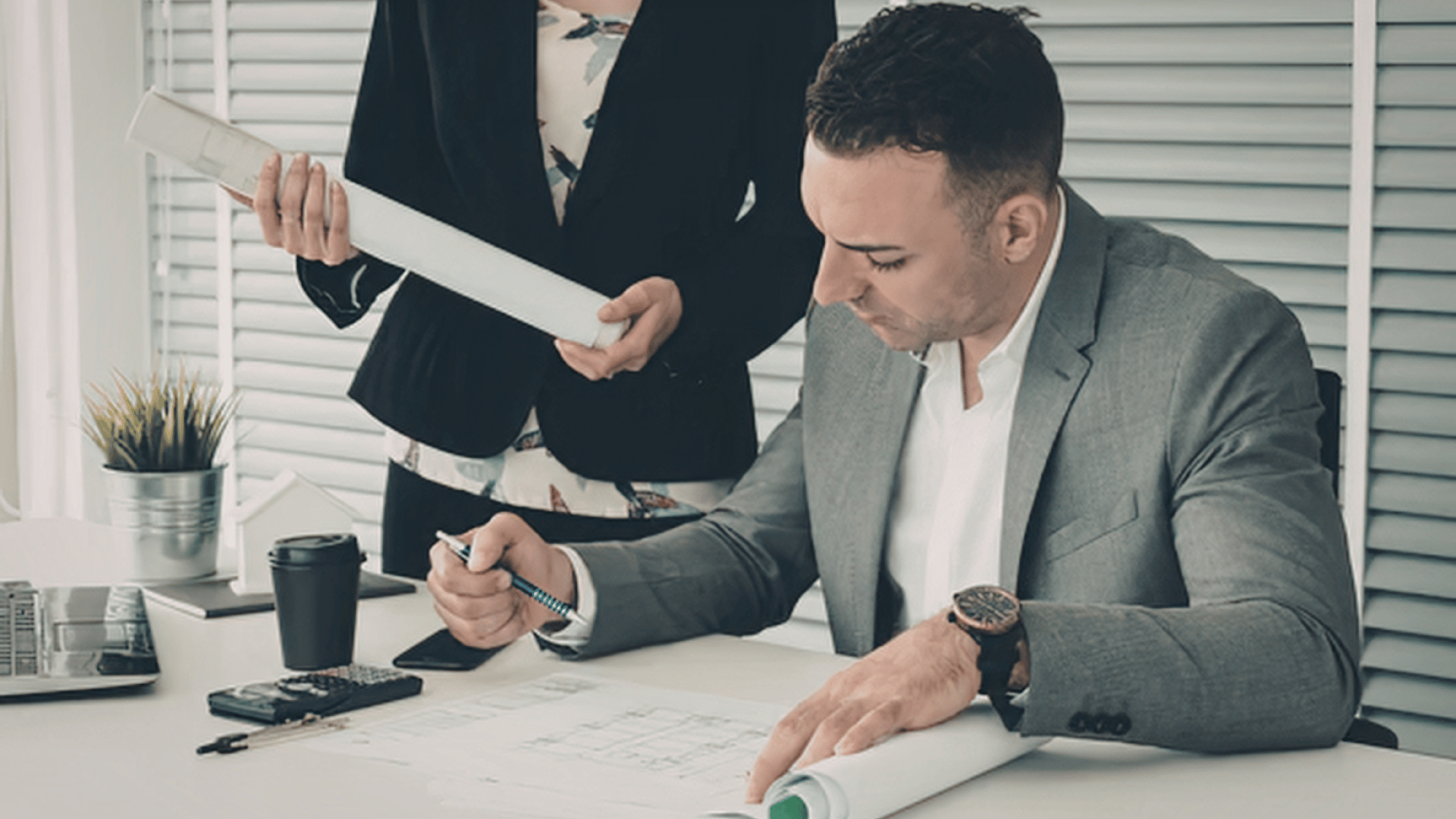 Business owner reviewing a business check before cashing payment