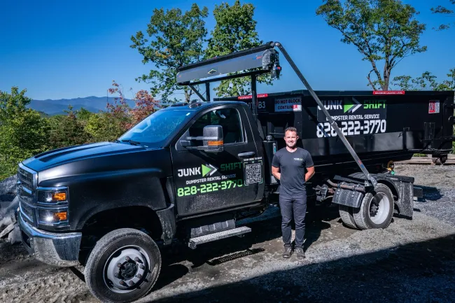 Junk Shift dumpster rental truck and owner in Western North Carolina
