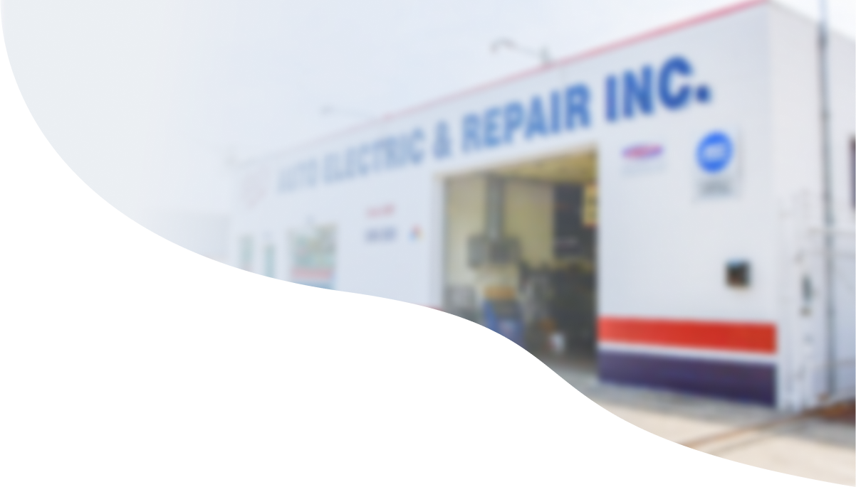A white building that says auto electric & repair inc.  | Bill's Auto Electric Repair Inc