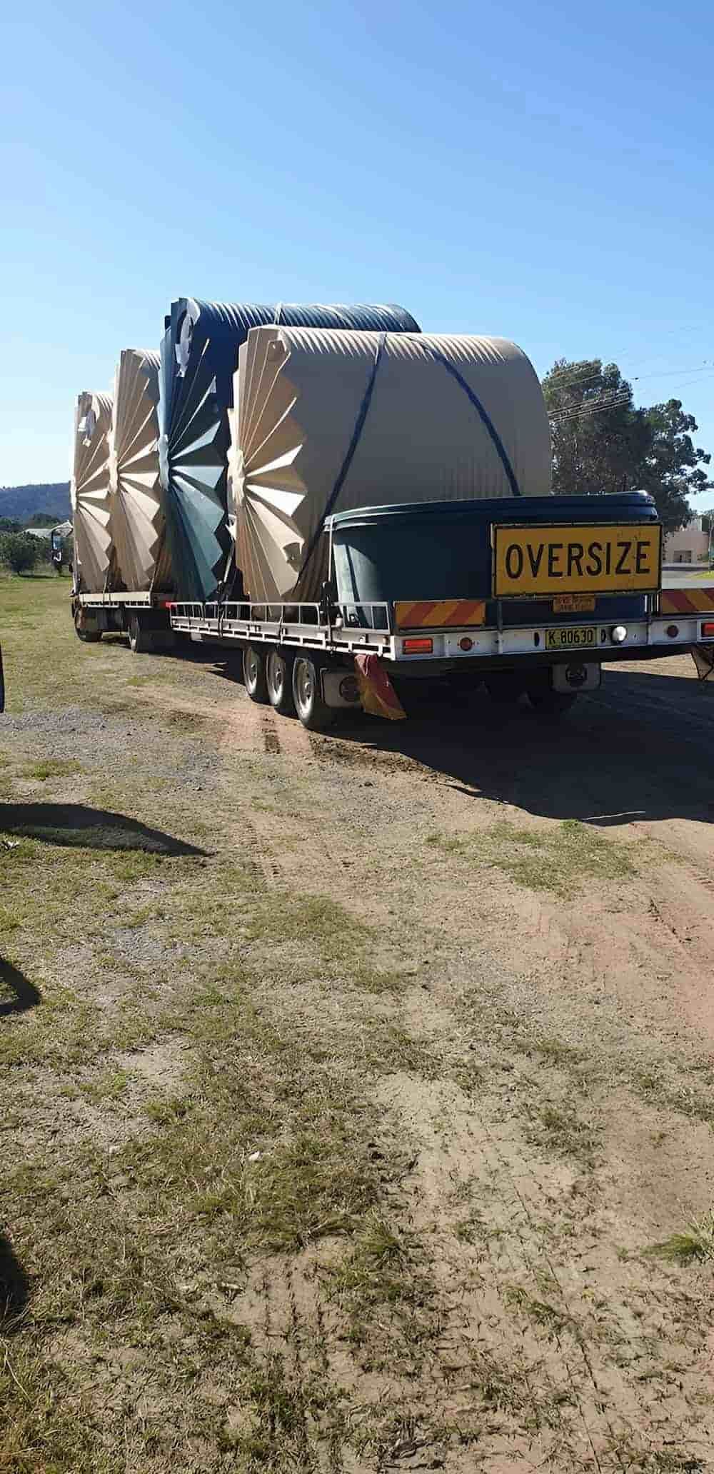 A Large Truck Is Parked In A Dirt Field — Manning Valley Pumps And Irrigation In Nabiac, NSW