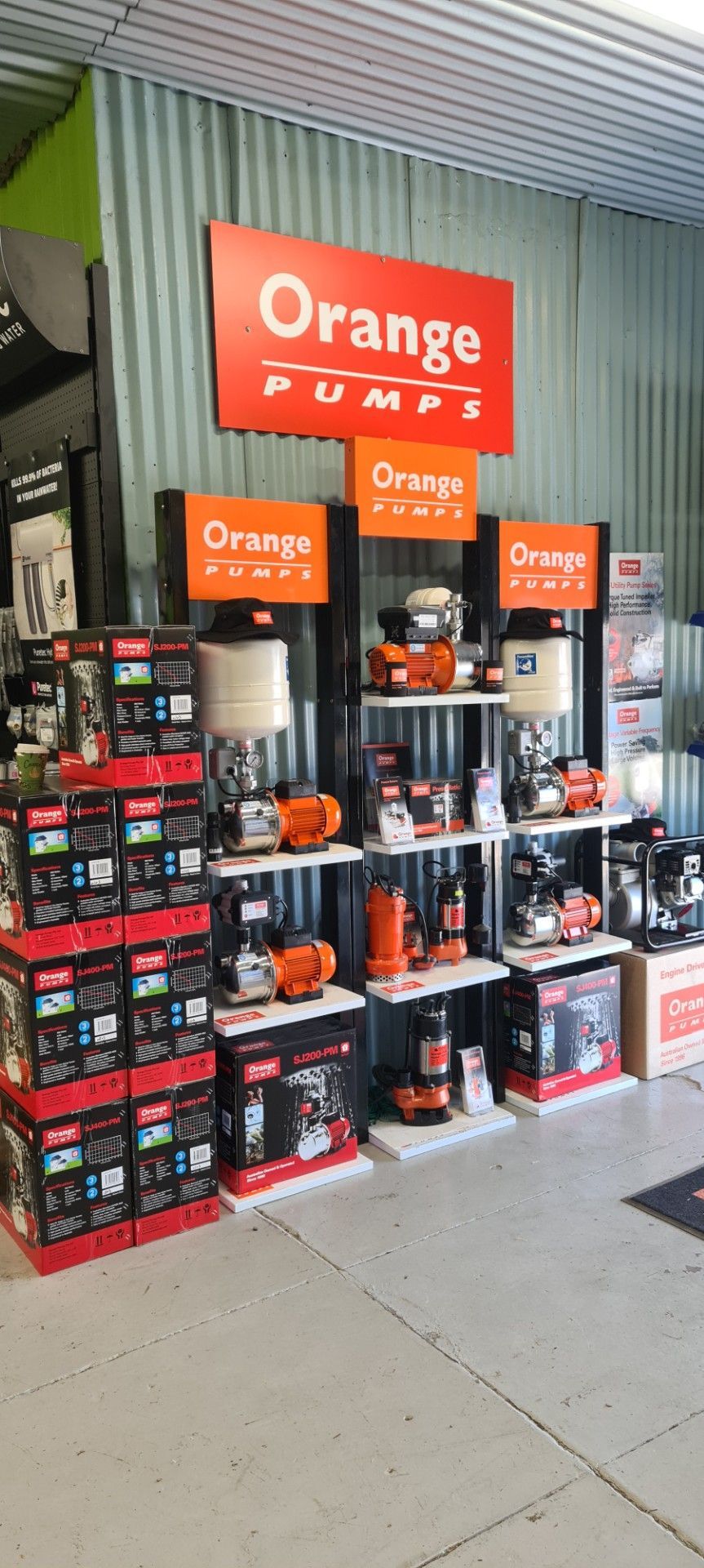 A Warehouse Filled With Lots Of Hose And Boxes — Manning Valley Pumps And Irrigation In Taree, NSW