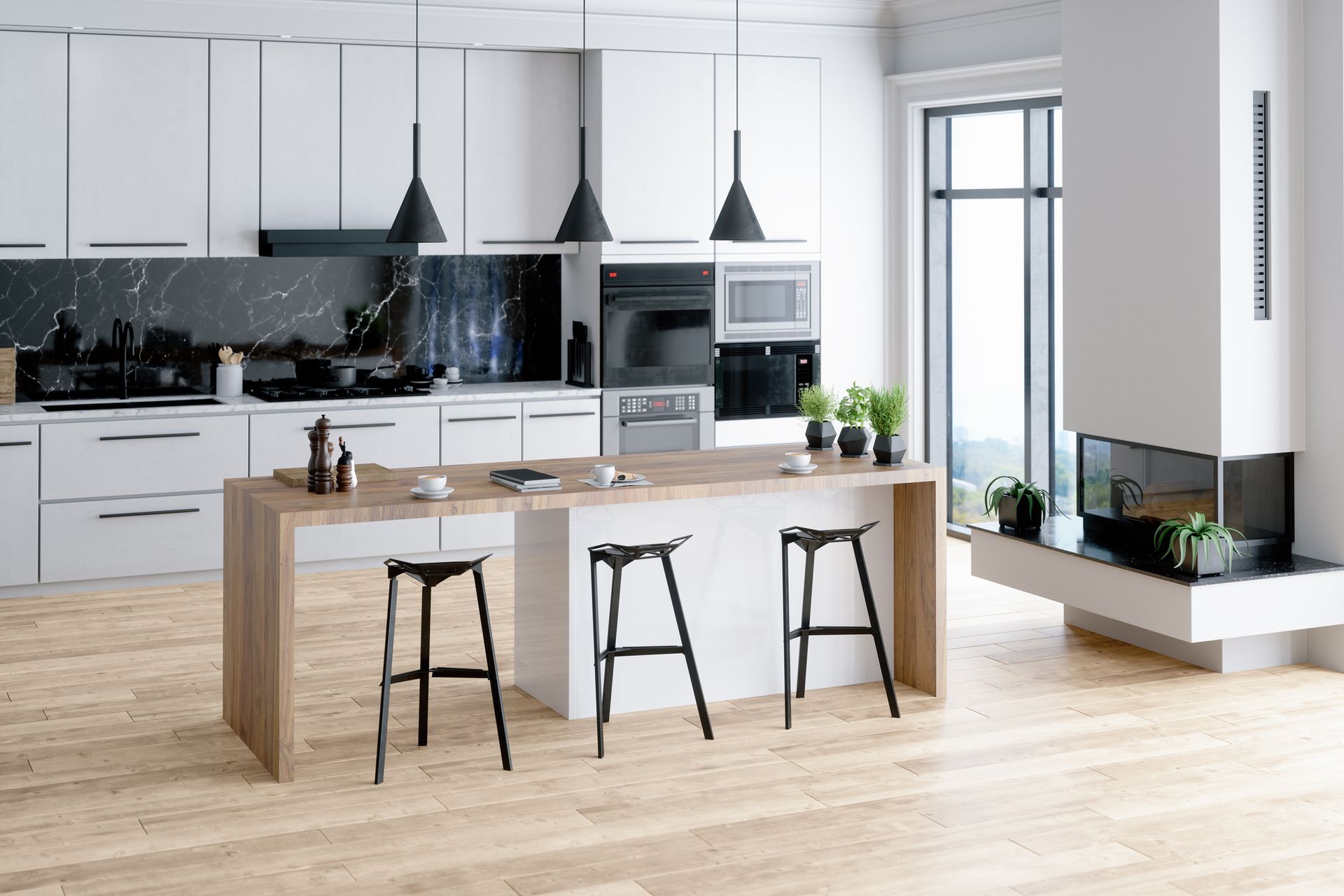 Modern white kitchen with black accents, island with stools, three pendant lights, and large window.