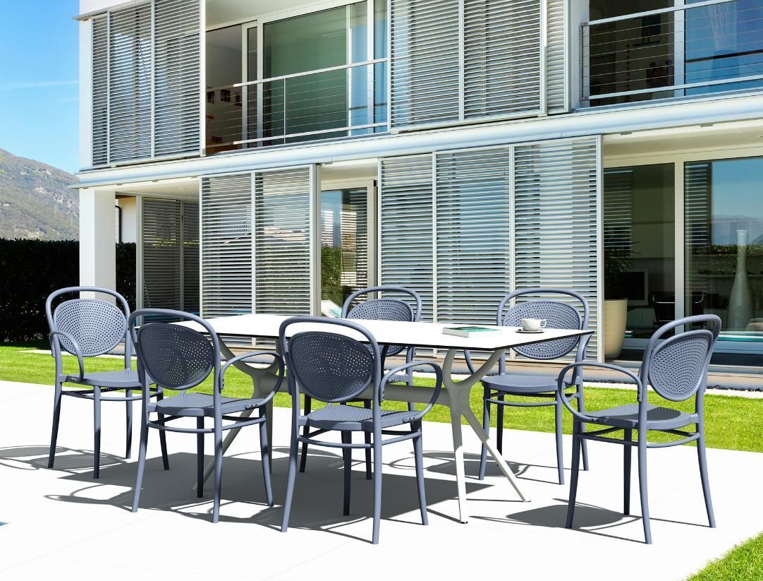 Gray Table and Chairs on a Sunny Patio — Creative Commercial Furniture in Mackay, QLD