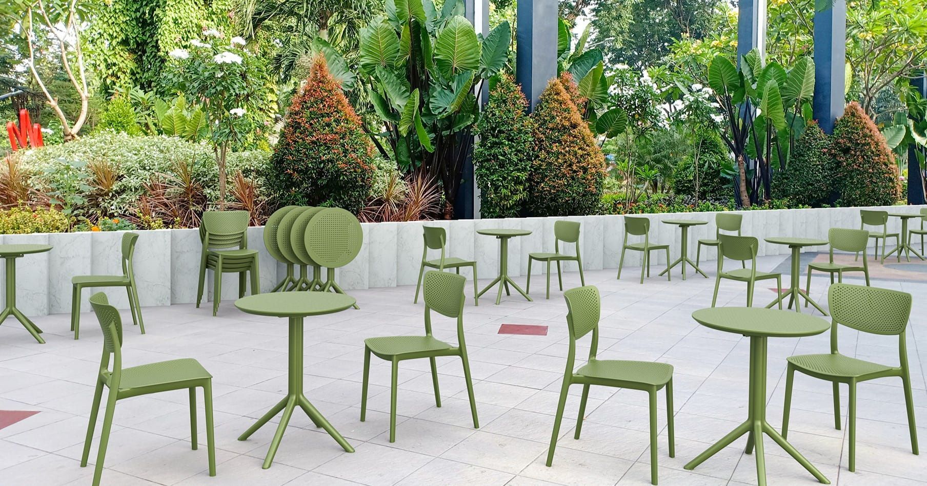 Row of Green Chairs and Tables in a Garden — Creative Commercial Furniture in Sydney, QLD