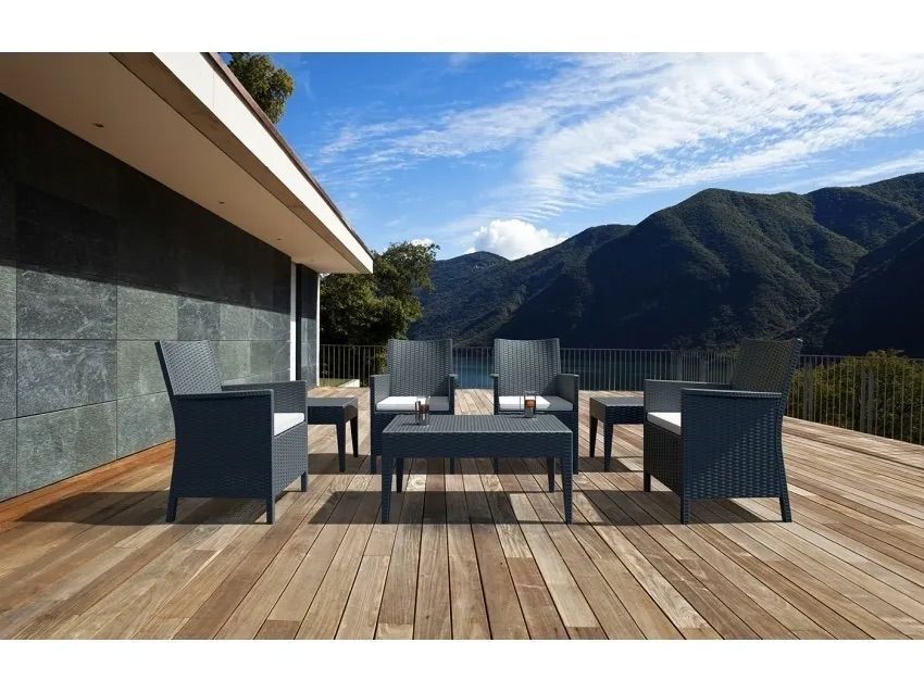 A Wooden Deck With a Patio Set and Mountains in the Background — Creative Commercial Furniture in Cairns City, QLD 