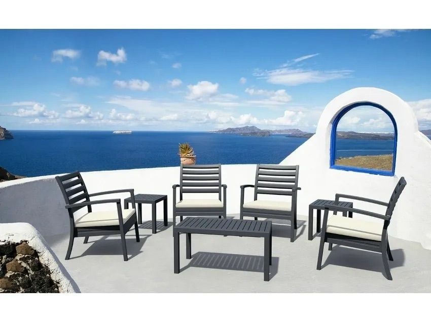 A Patio With Chairs and a Table Overlooking the Ocean — Creative Commercial Furniture in Cairns City, QLD 