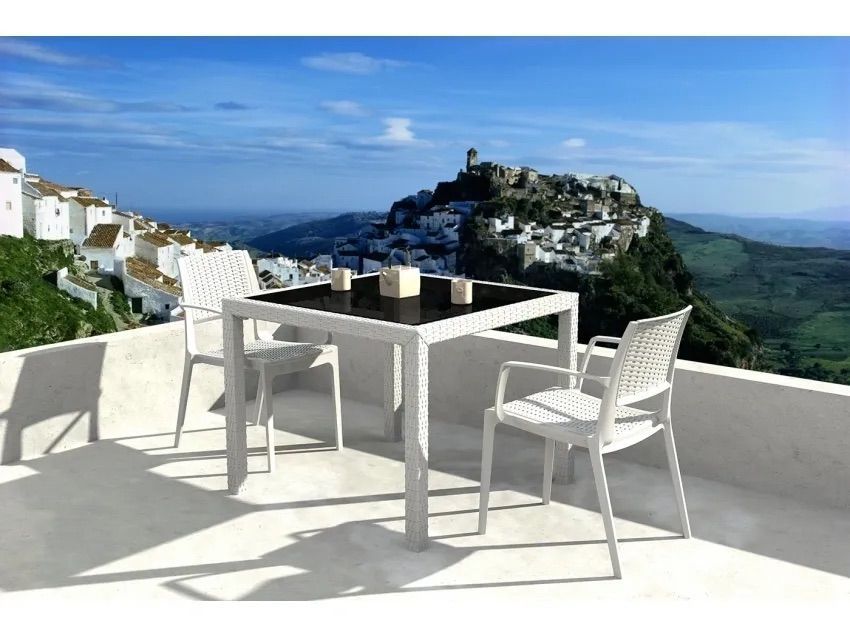 A Table and Chairs on a Balcony Overlooking a Mountain — Creative Commercial Furniture in Cairns City, QLD 