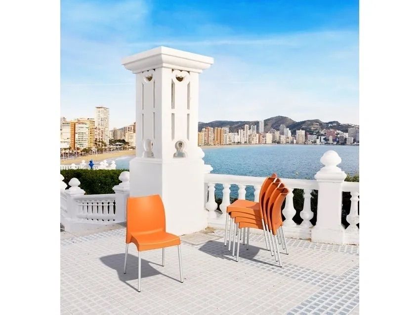 Orange Chairs on a White Tiled Balcony — Creative Commercial Furniture in Cairns City, QLD