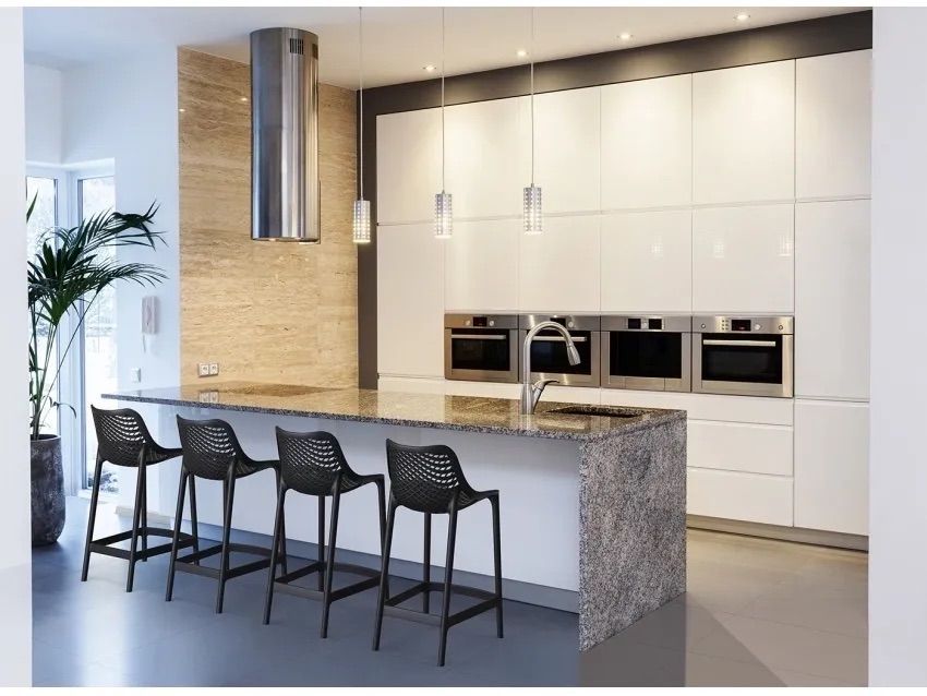 A Kitchen With White Cabinets and Stainless Steel Appliances — Creative Commercial Furniture in Cairns City, QLD 