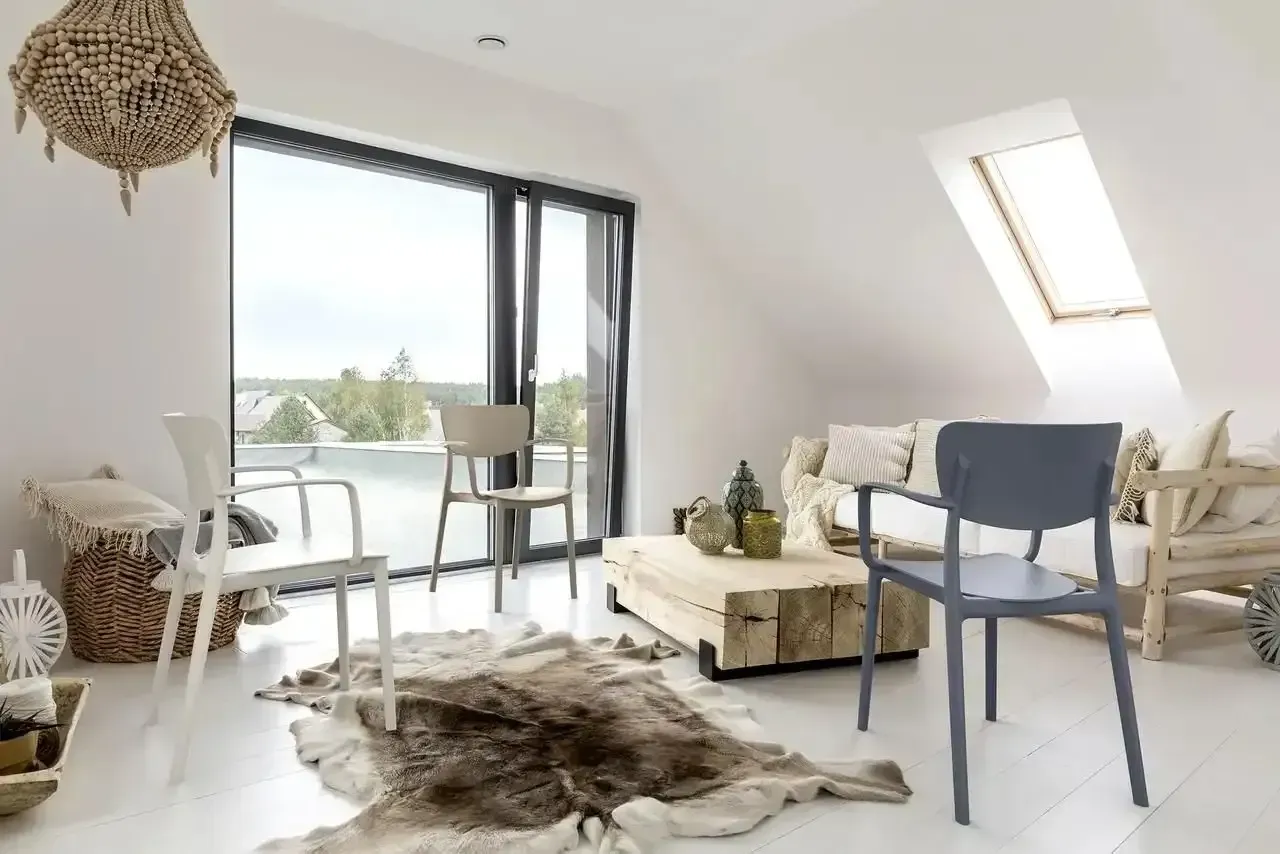 Bright, Airy Living Room With a Large Window — Creative Commercial Furniture in Mackay, QLD