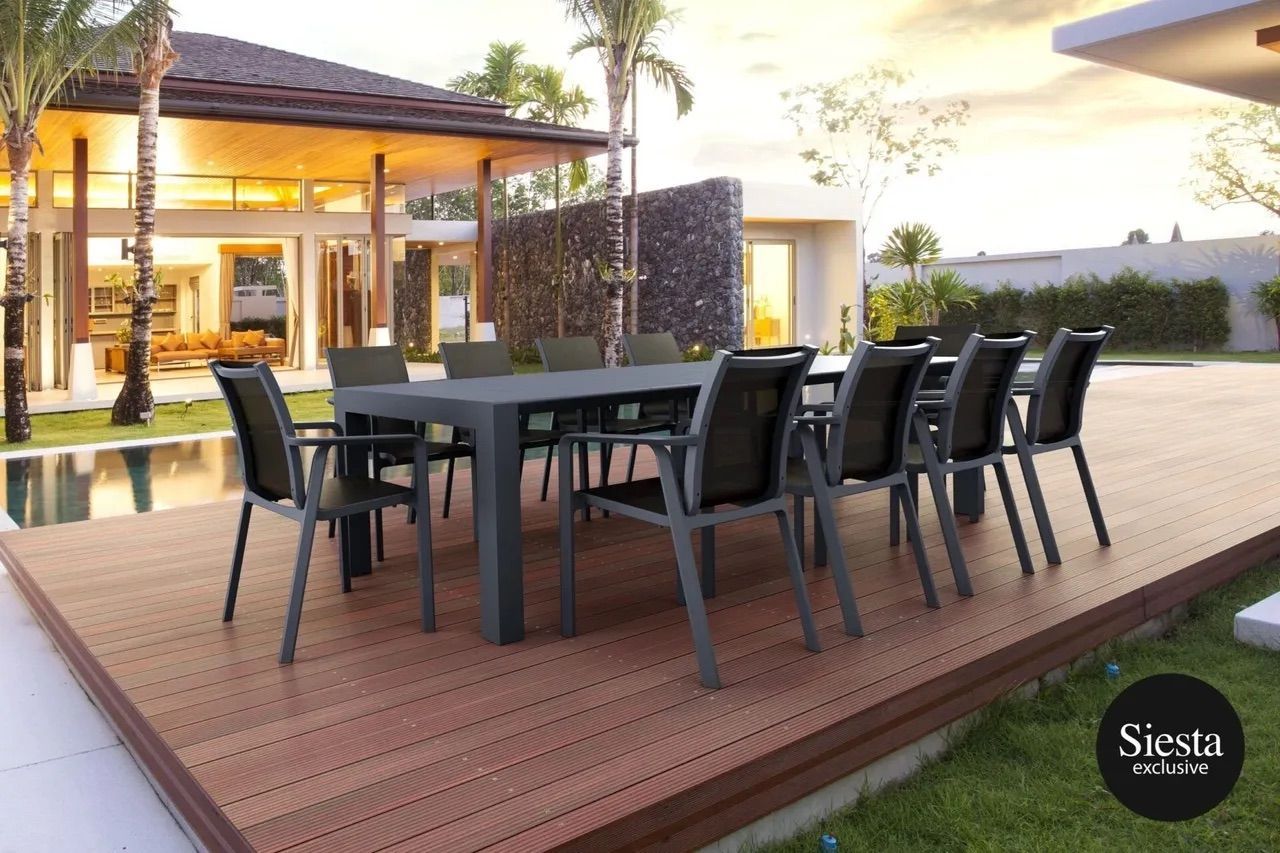 A Table and Chairs on a Deck With Siesta Written on the Bottom — Creative Commercial Furniture in Cairns City, QLD 