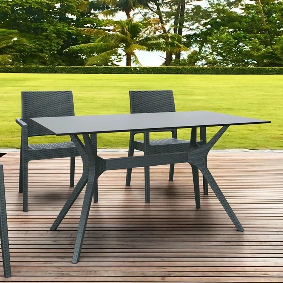 A Patio Set With a Table and Chairs on a Wooden Deck — Creative Commercial Furniture in Cairns City, QLD 