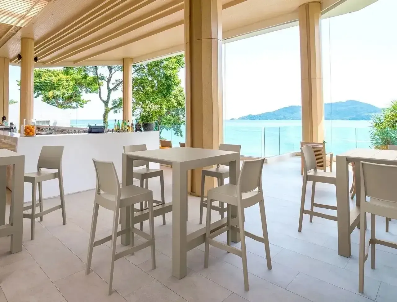 Open-air Bar With Light-colored Tables and Chairs — Creative Commercial Furniture in Sunshine Coast, QLD