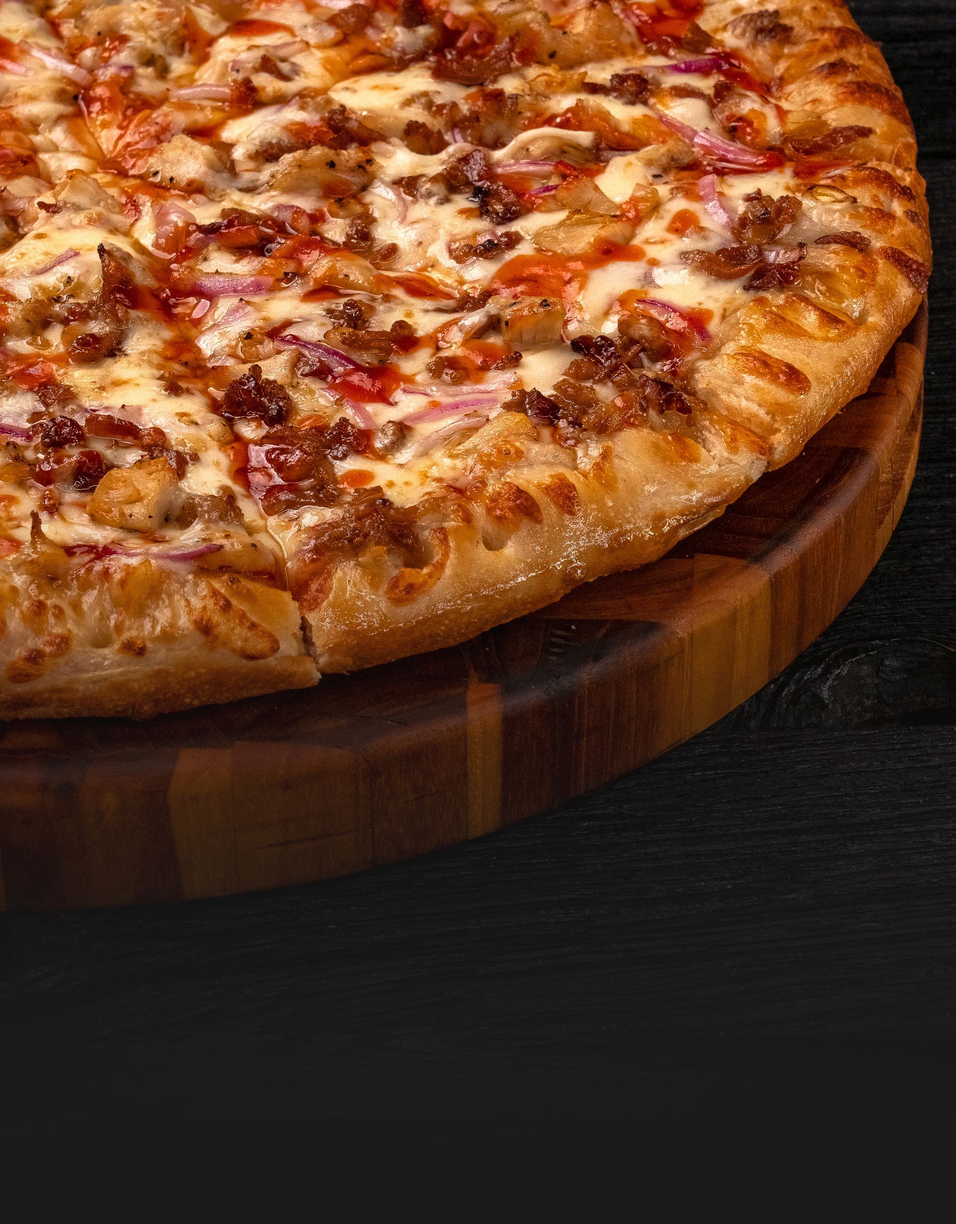 A closeup of a BBQ Chicken Pizza