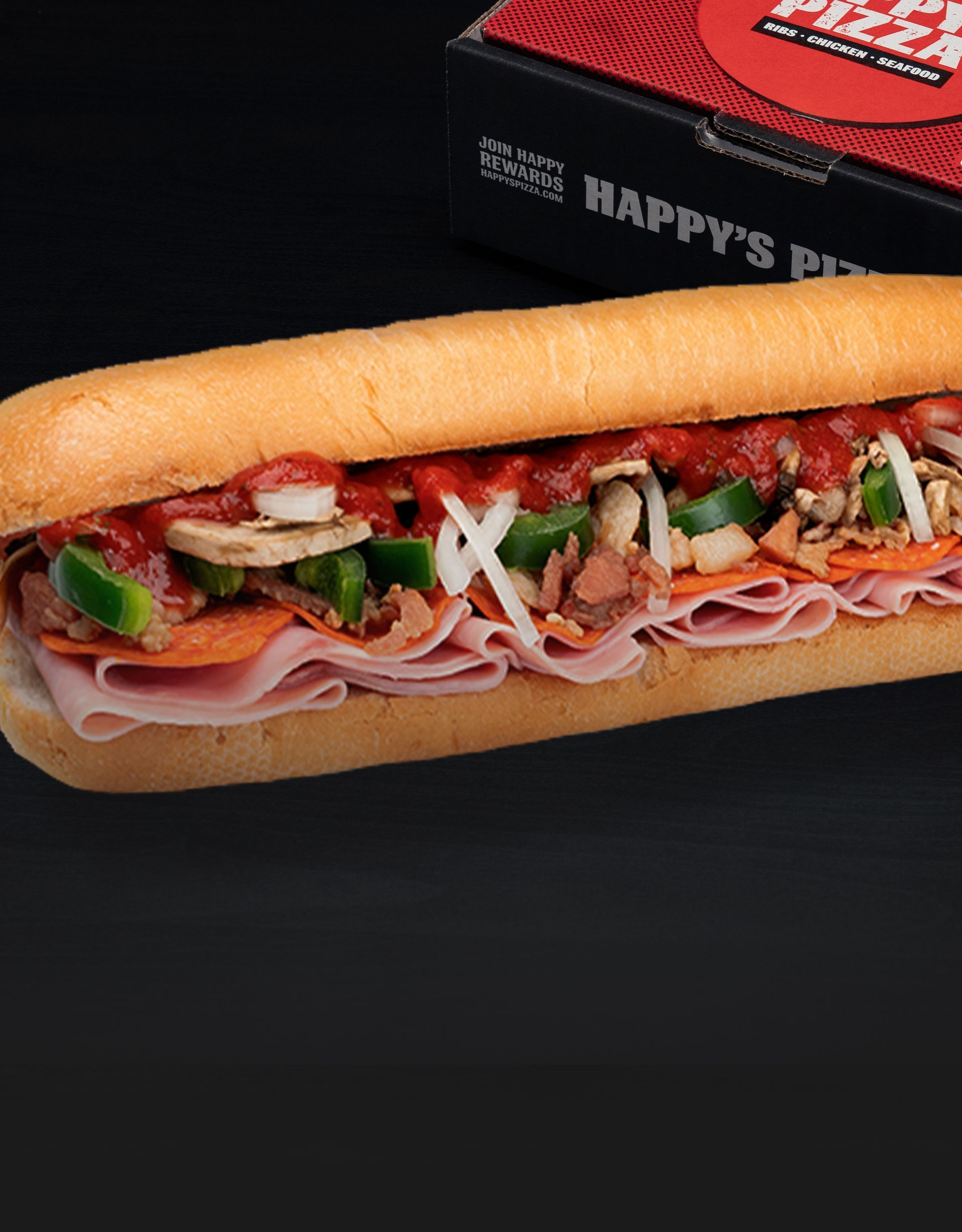 Pizza Sub: A delicious blend of deli meats, marinara sauce, melted cheese, and fresh herbs in a toasted roll.