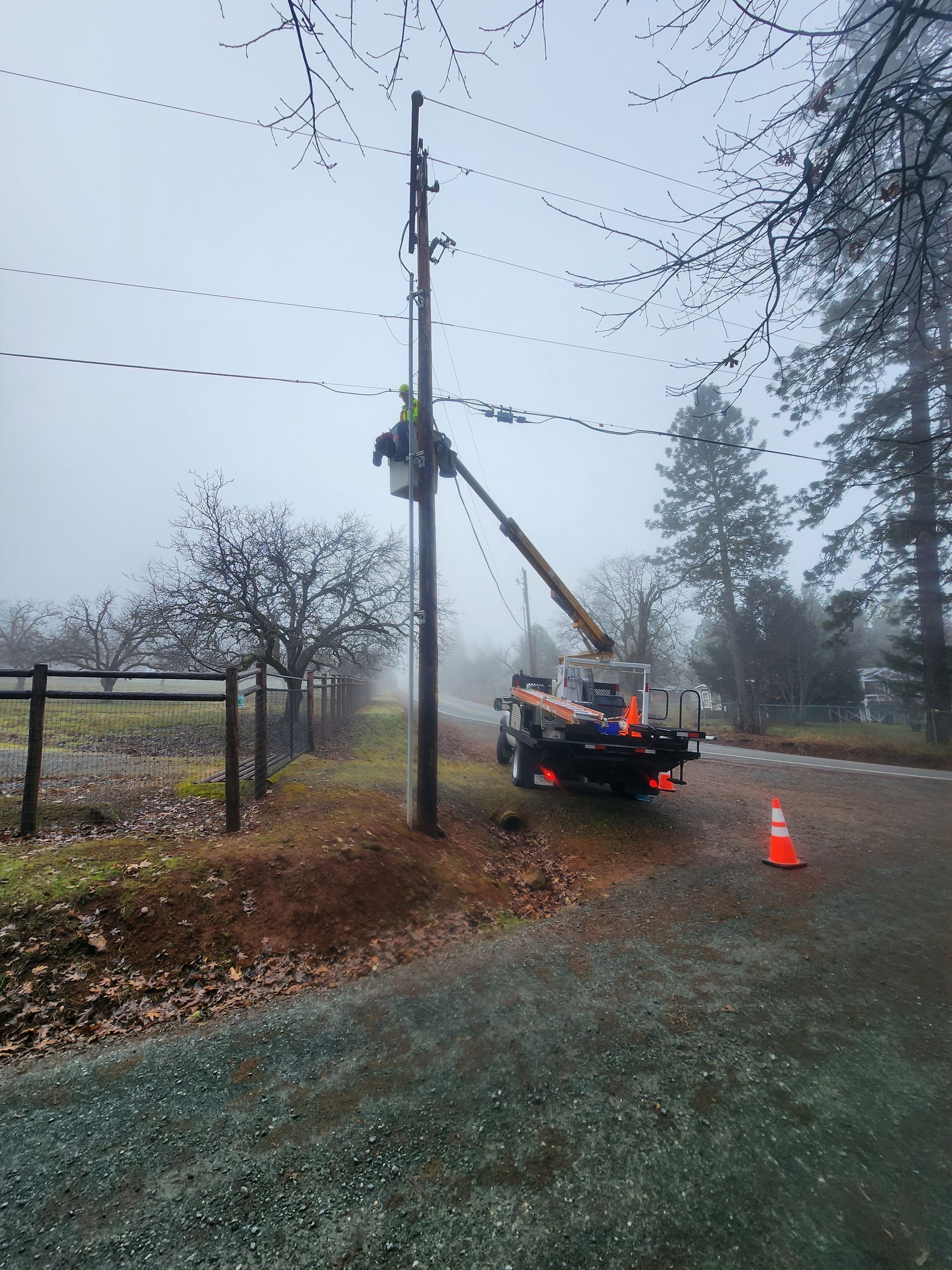 Manning Cable Services setting up a new telecommunications line in Auburn, Maine