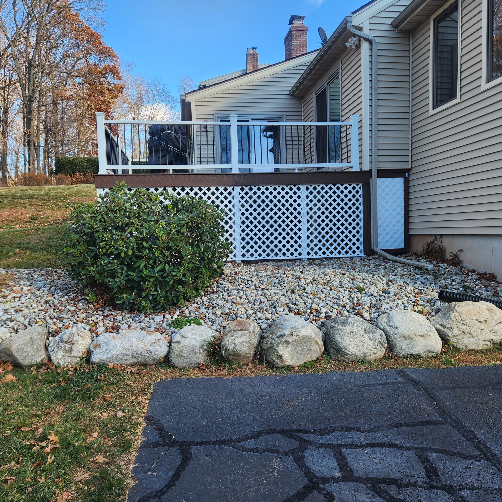 A finished deck construction and installation​ in Glastonbury CT by Exteriors of CT