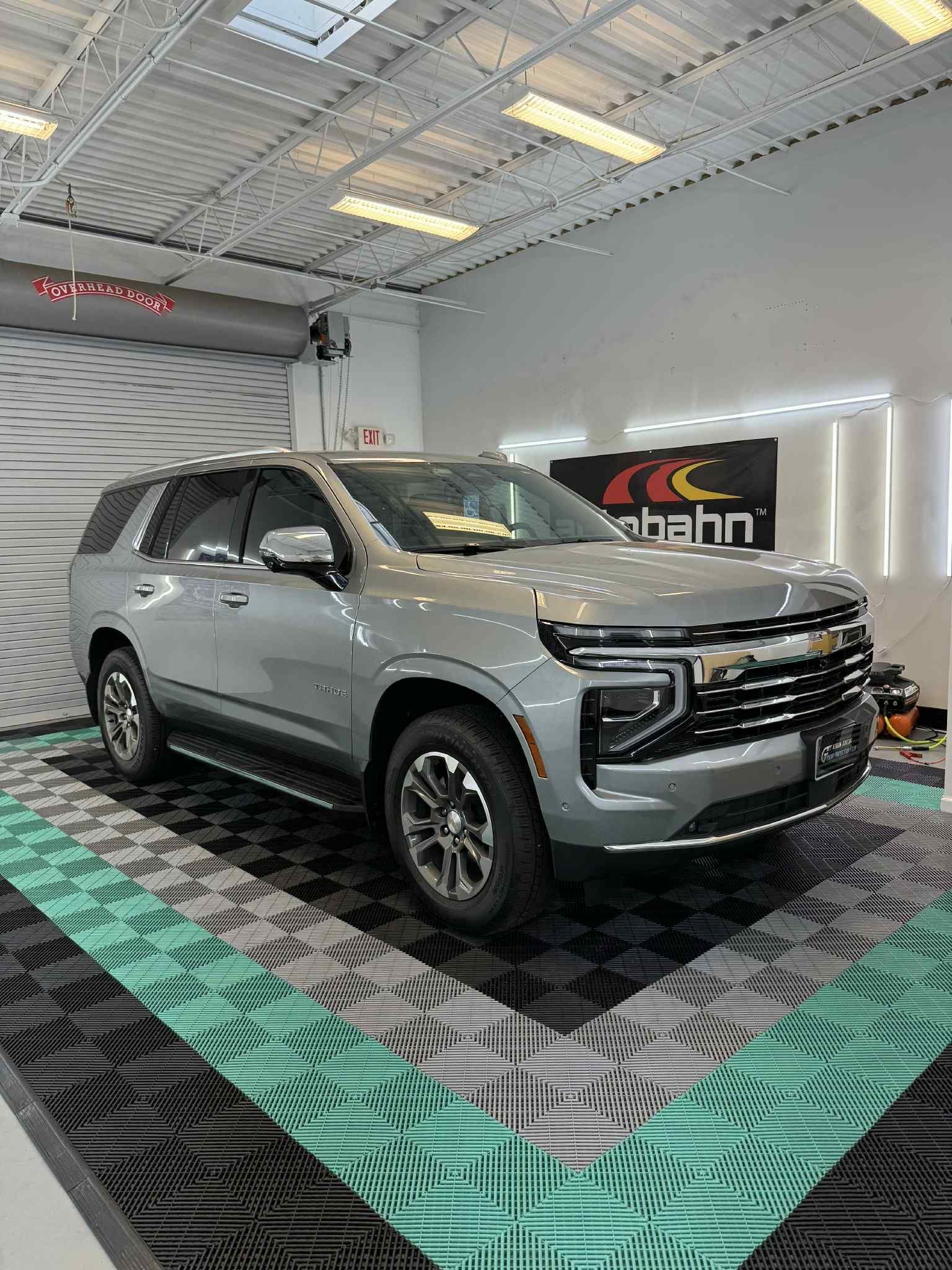 Silver SUV with Autobahn Ceramic Tint installed by GT Tinting in Hampton VA showroom