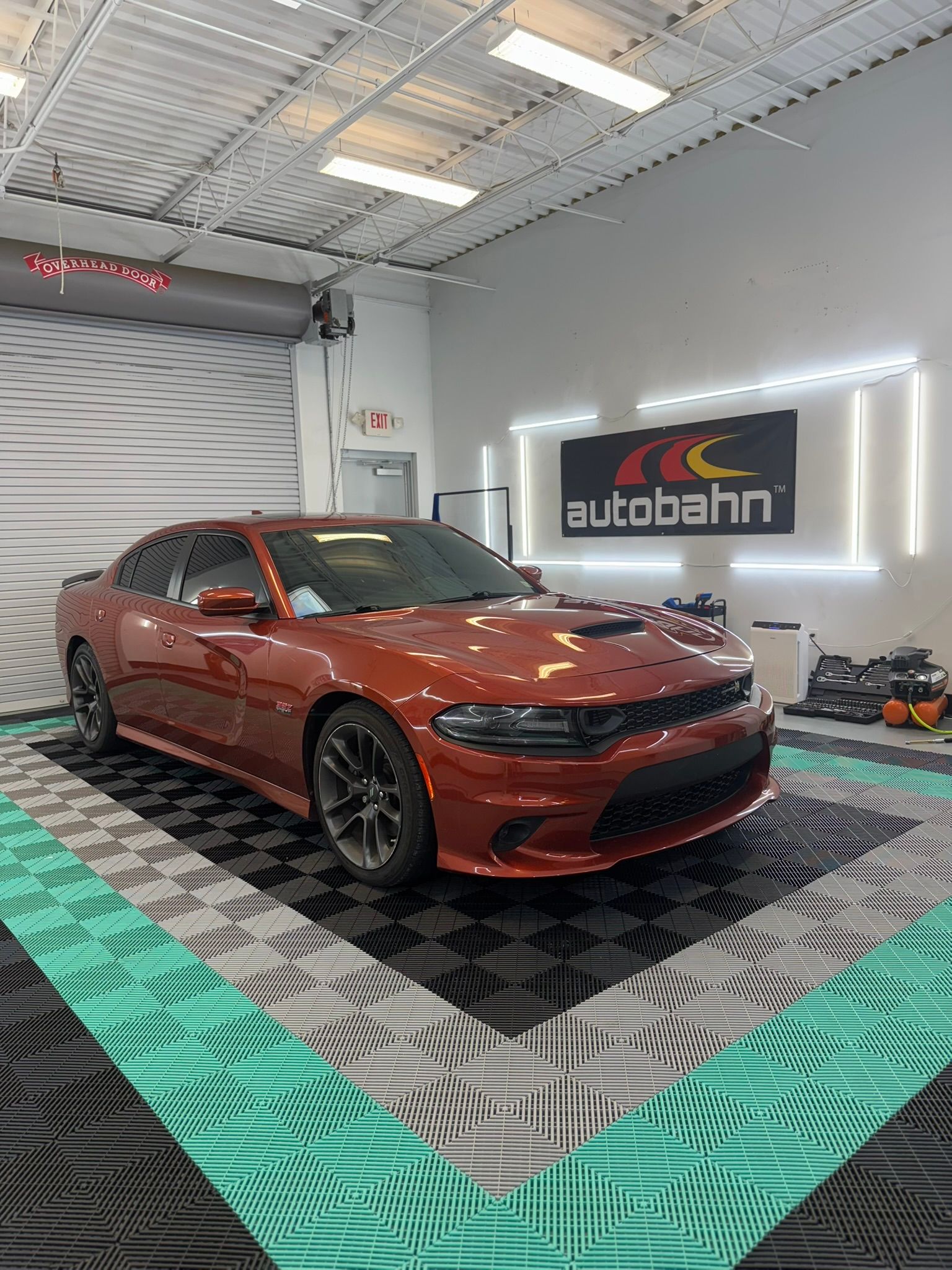 Dodge Charger with glossy ceramic coating finish at GT Tinting, Hampton VA
