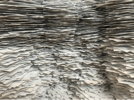 A pile of papers stacked on top of each other