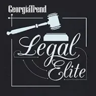 A logo for georgia trend legal elite with a judge 's gavel on a black background.