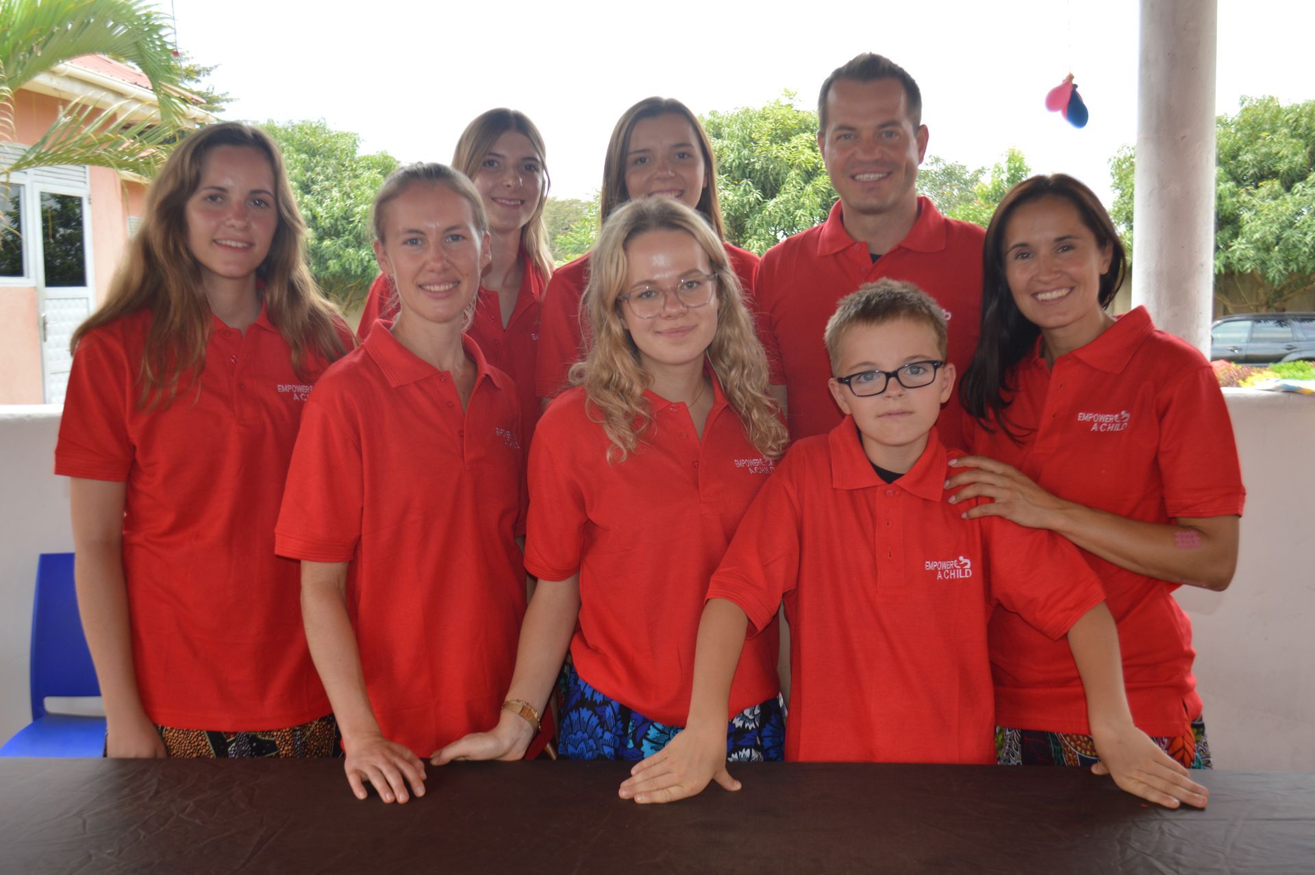 A group of volunteers posing for a photo.