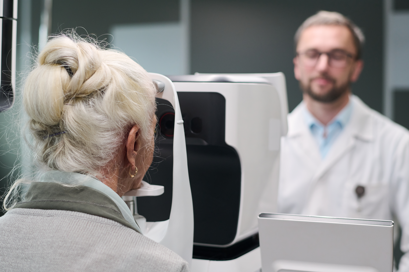 Woman undergoing an eye exam with a specialist in a clinic