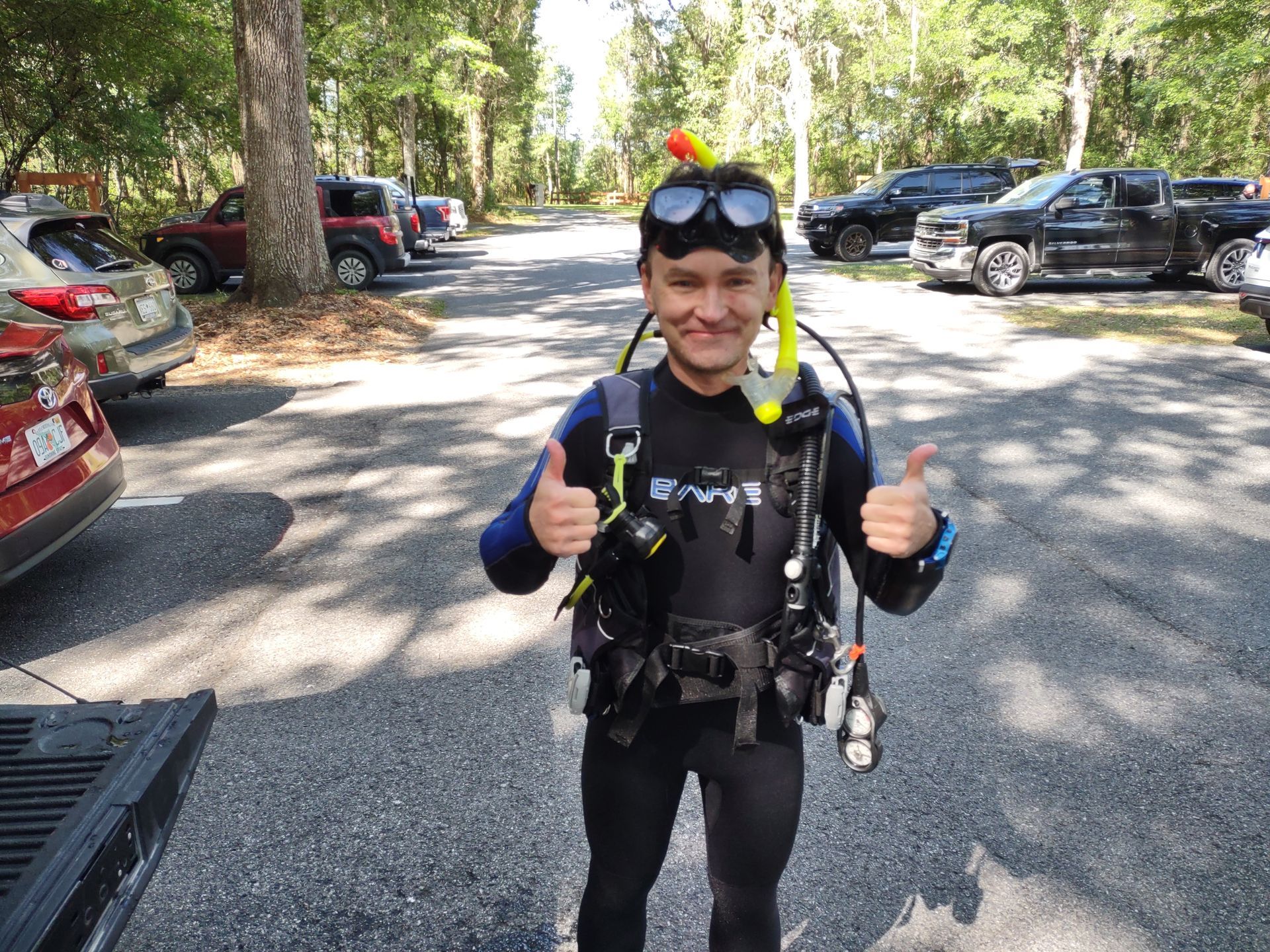 Scuba instructor guiding student at a North Florida spring