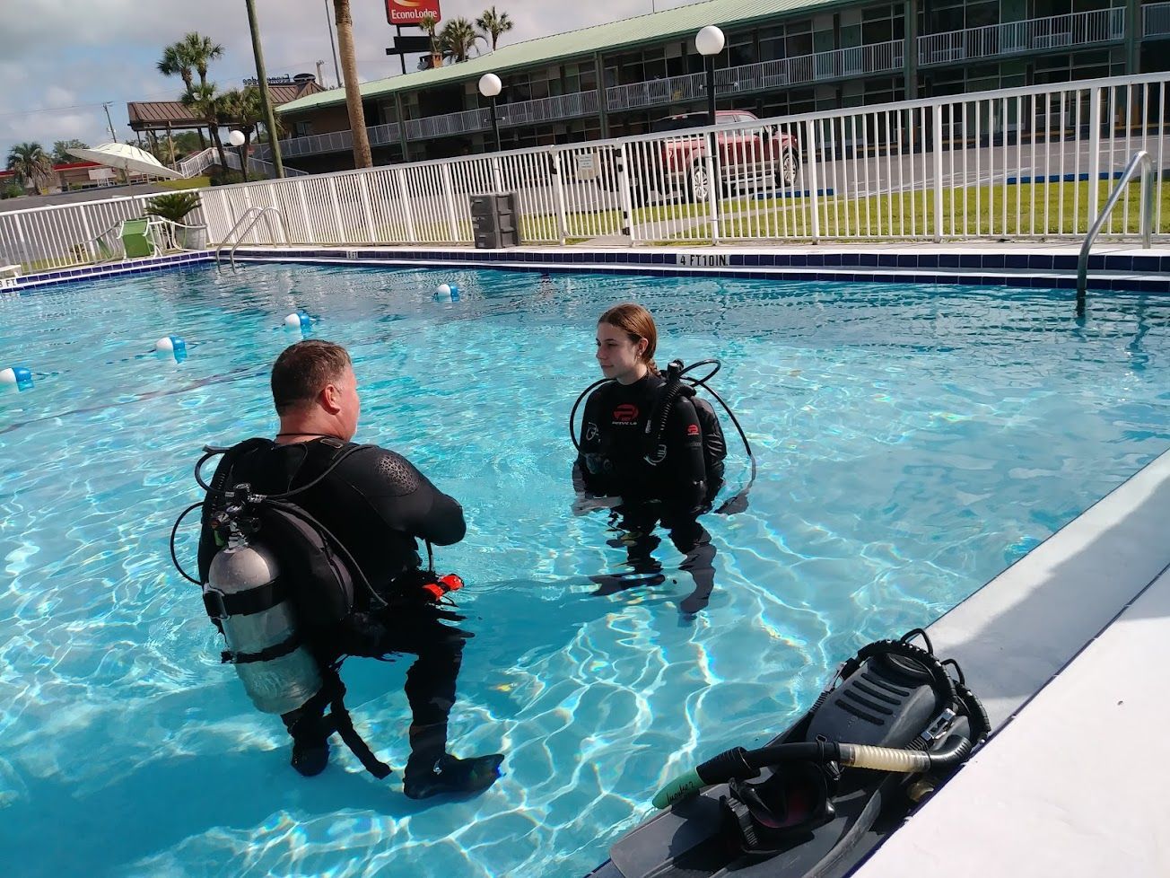 Scuba instructor guiding student at a North Florida spring
