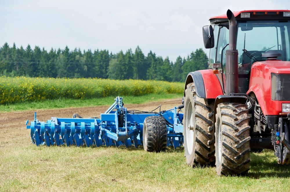 Heavy Tractor During Cultivation Agriculture Works — Bearfast Bearquip In Taminda NSW