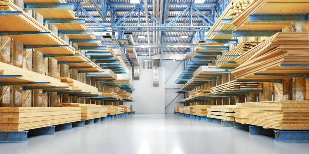 A warehouse filled with lots of wooden shelves.