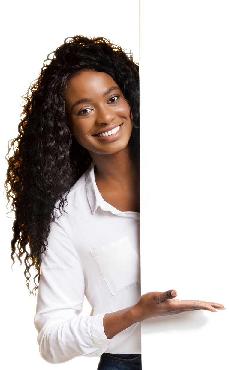 A woman is holding a white sign and smiling.