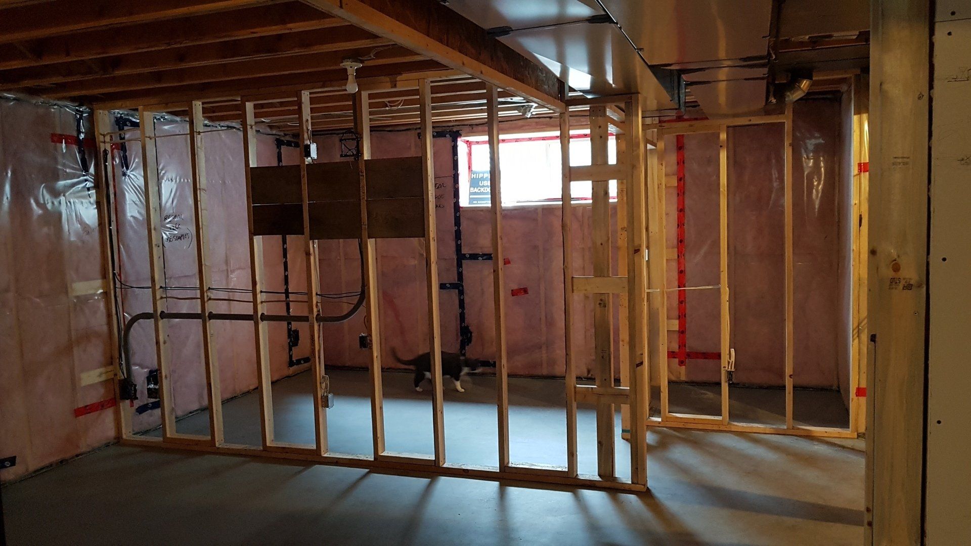 Unfinished basement before Nichols Electric did electrical work