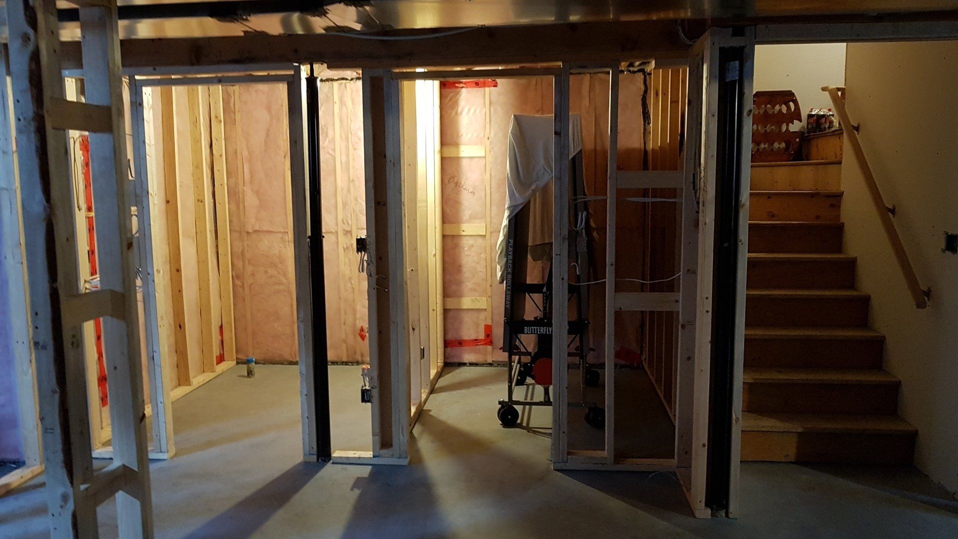 Unfinished basement before Nichols Electric did electrical work