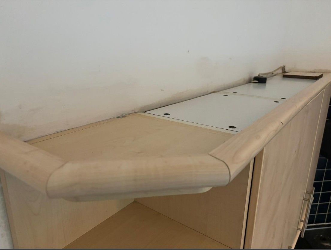 Squeaky Cleaners Nottingham after cleaning the dust and dumped items from the top of a wardrobe in Hoveringham