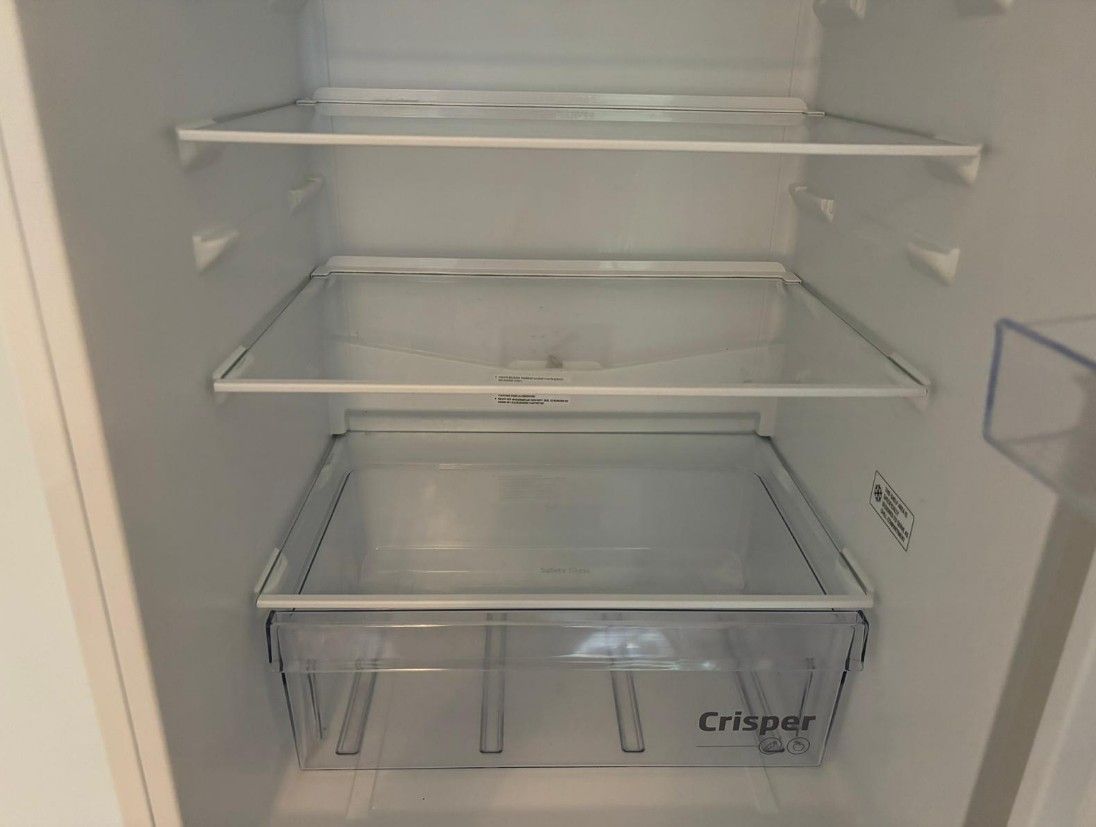 Squeaky Cleaners Nottingham after cleaning the the inside of a fridge in Hoveringham