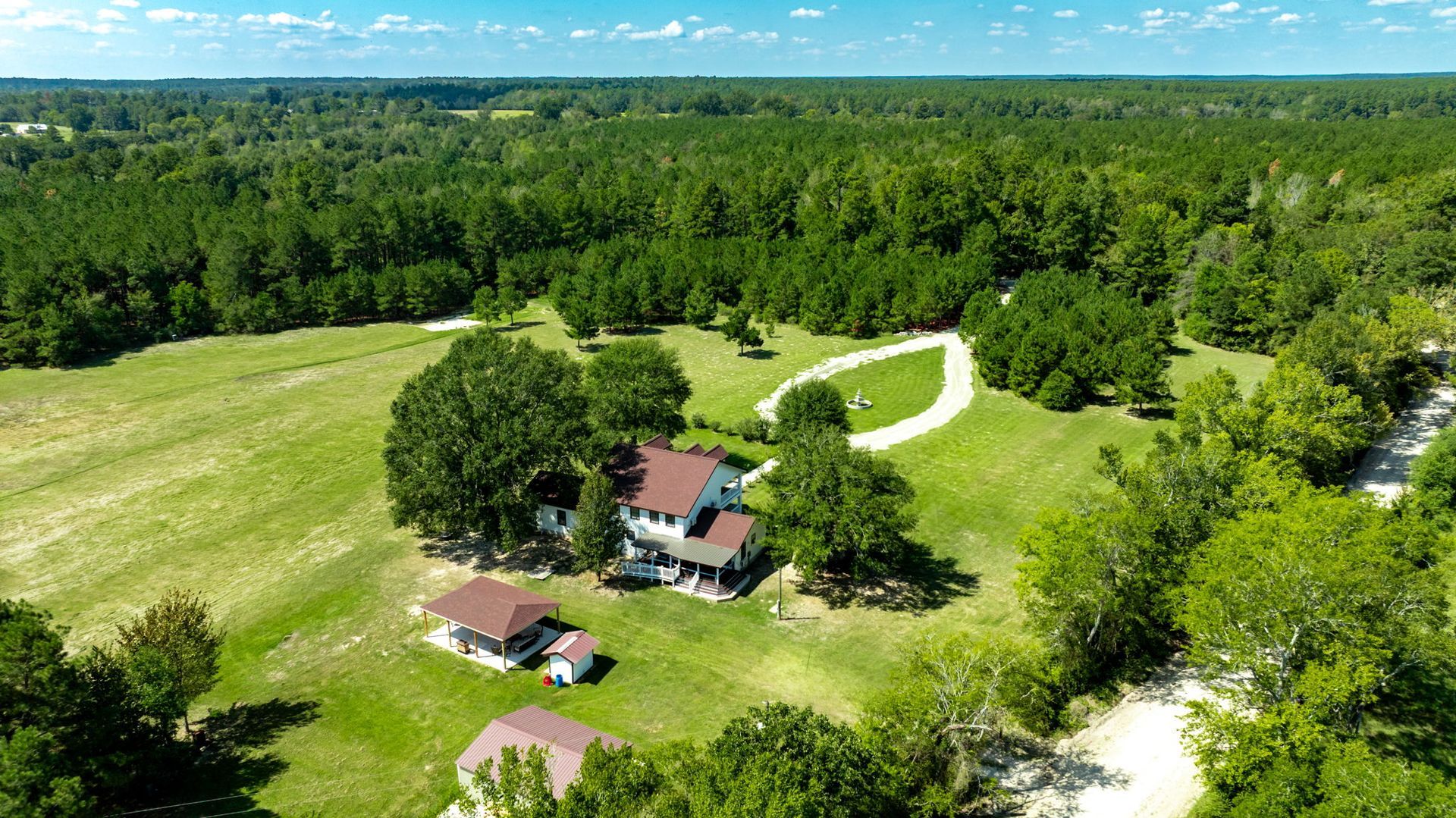Aerial view of The Greystone Estate on 20 acres of East Texas countryside