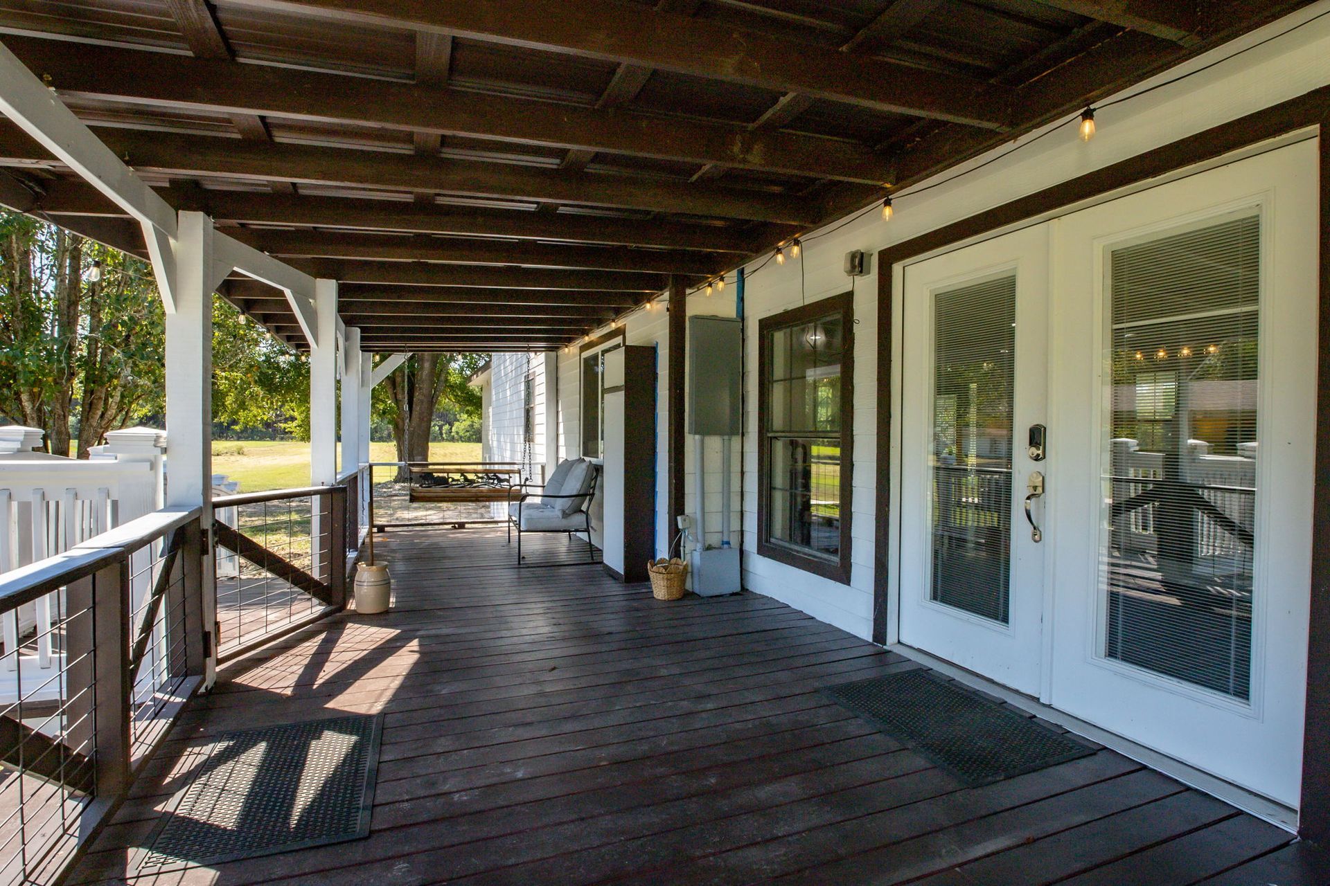 Covered back porch with French doors