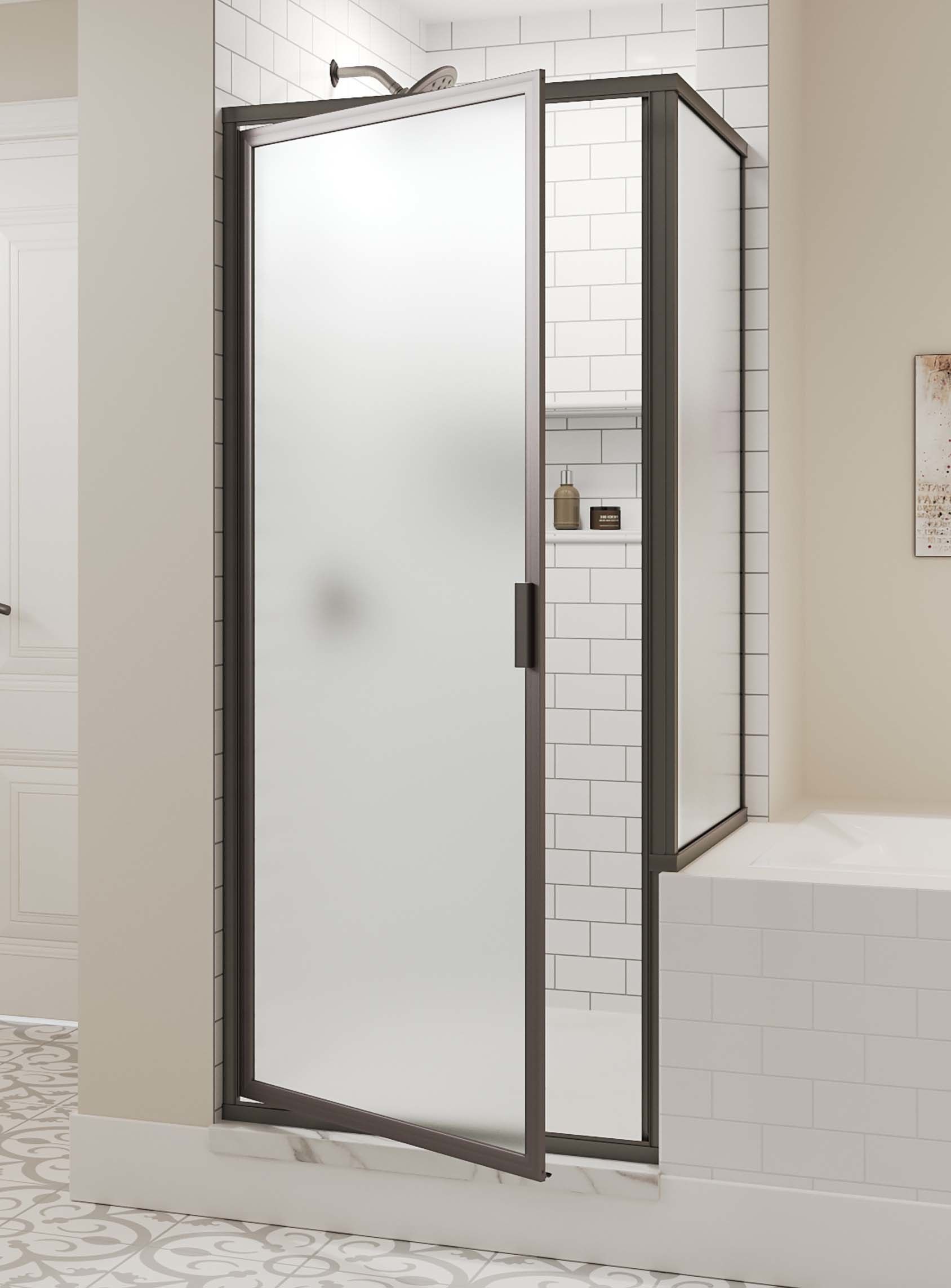 A bathroom with a sliding shower door and a bathtub.