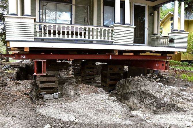 A house is being moved to a new location.