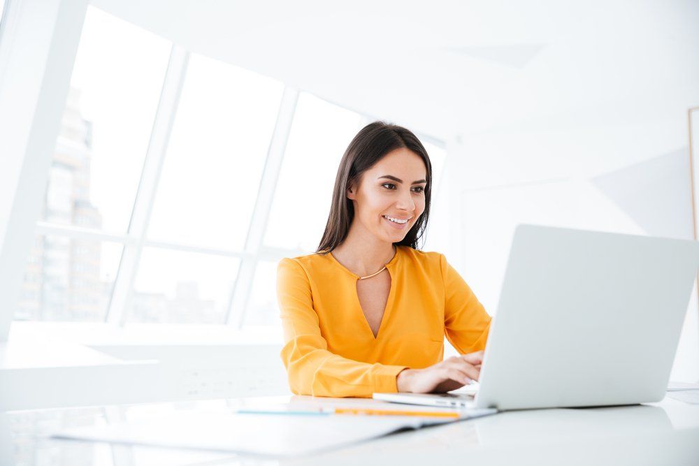 Woman Using Laptop