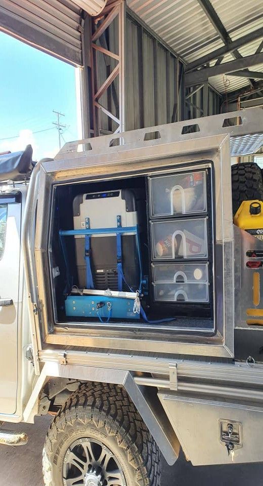 A Truck with A Canopy on Top of It Is Parked in A Garage — K & S Sheetmetal in Gladstone Central, QLD