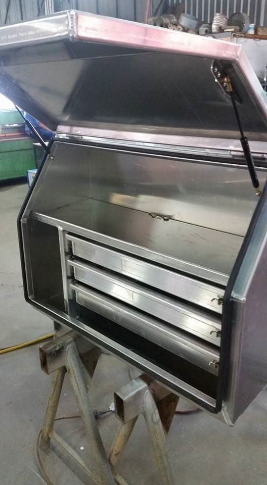 A Stainless Steel Toolbox Is Sitting on Top of A Wooden Table — K & S Sheetmetal in Gladstone Central, QLD