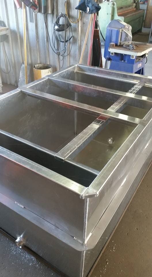 A Large Stainless Steel Tank Is Sitting on Top of A Table — K & S Sheetmetal in Gladstone Central, QLD