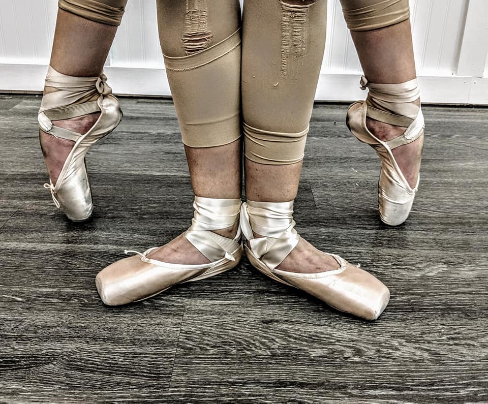 legs of young dancers ballerinas