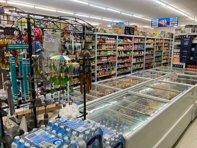 Grocery Store Interior With Shelves of Food — Pigglys Supermarket, Takeaway & Bottle Shop in The Gap, NT