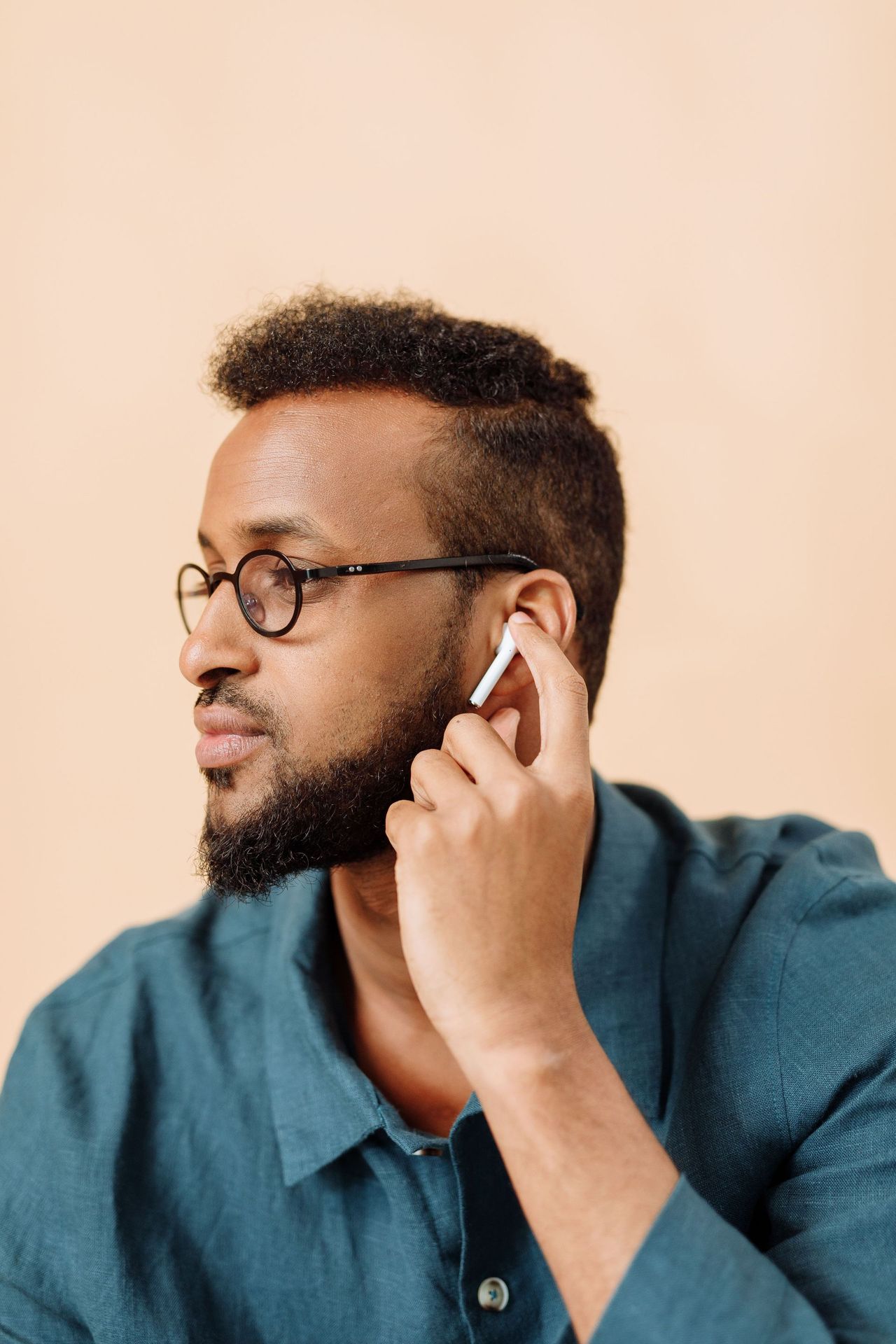 Man with a clean ear and neckline after ear waxing in Seattle